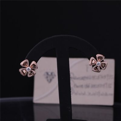 Real Gold High Jewelry Fiorever Earrings in 18 kt Rose Gold Earrings set with two central diamonds and pavé diamonds