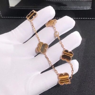 Vintage Alhambra bracelet, 5 motifs, 18K yellow gold, tiger’s eye.