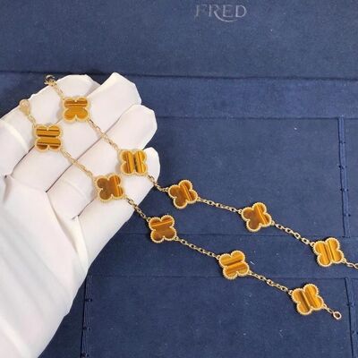 Vintage Alhambra bracelet, 5 motifs, 18K yellow gold, tiger’s eye.